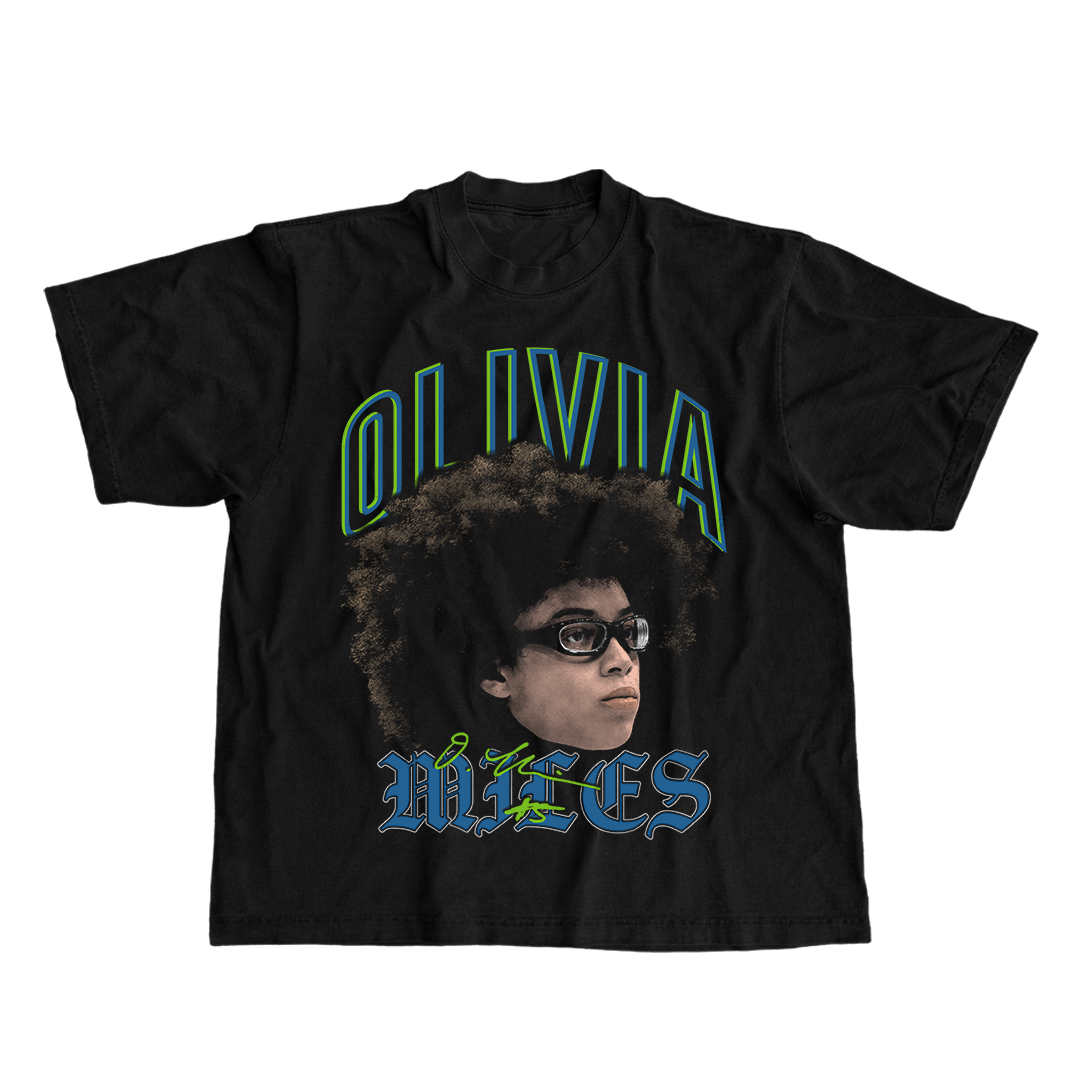 Black t-shirt with graphic of a person with an afro and text 'OLIVIA MILES' on a white background
