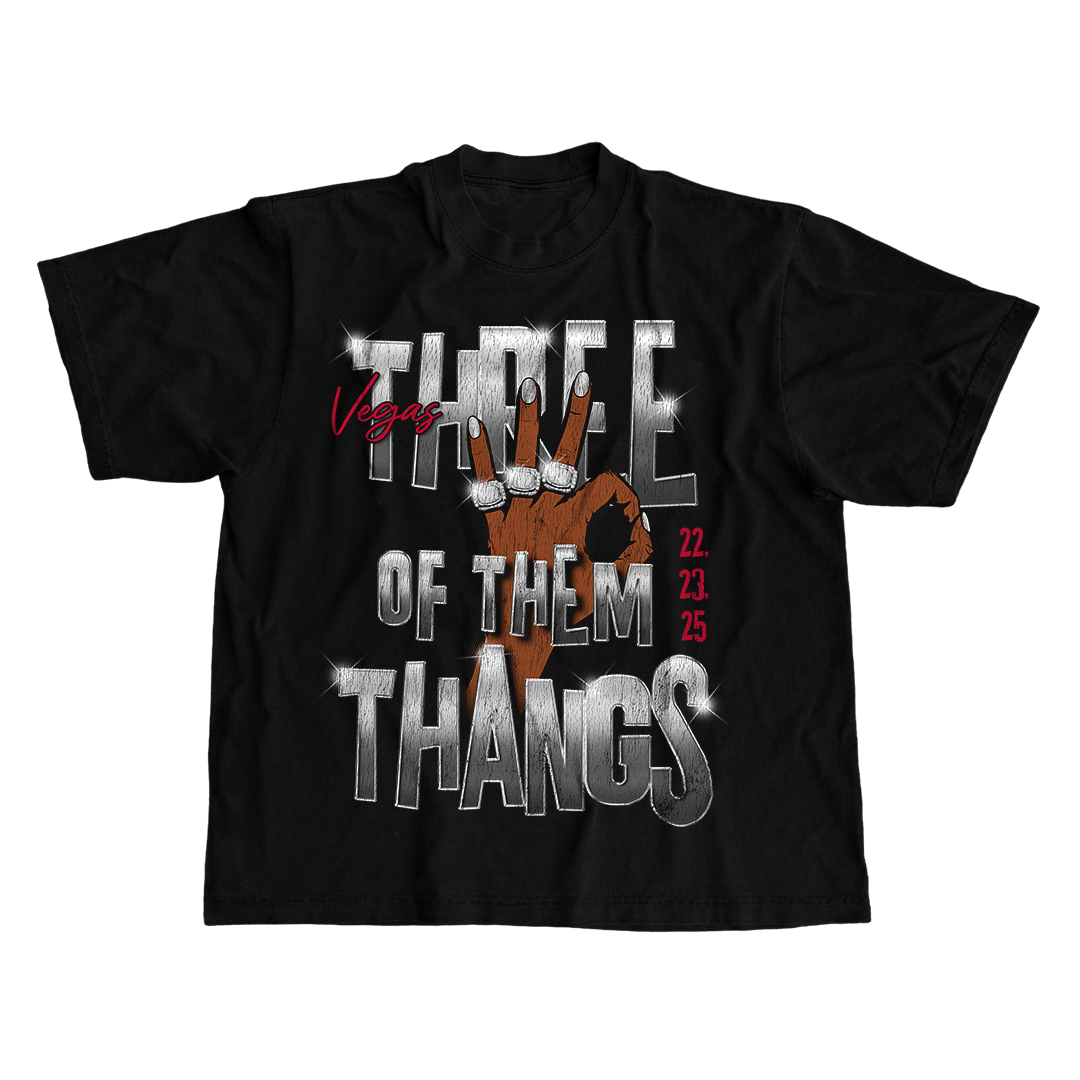Black t-shirt with graphic design and text on a white background